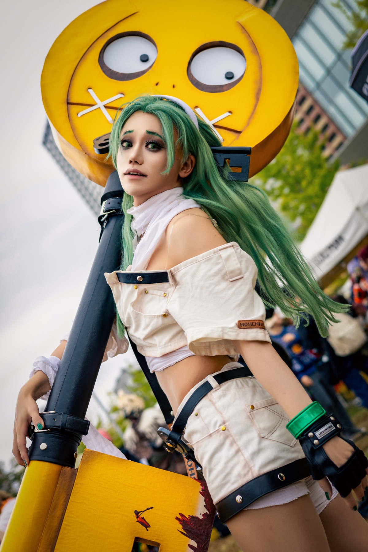 ONESAYA cosplaying A.B.A with a large Paracelsus prop